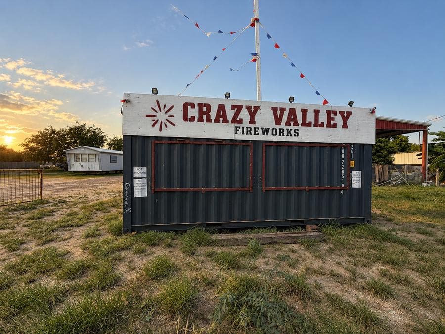 Crazy Valley Fireworks stand on Mile 7 Road at sunset